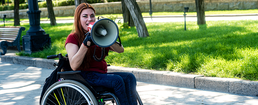 woman speaking into megaphone