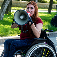 woman speaking into megaphone