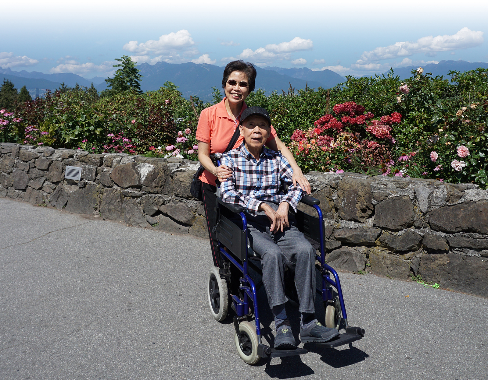 Anita and Thomas smiling on pathway