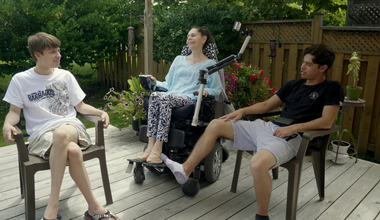 Carolina and her kids on back porch