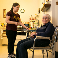 MODC Attendant Care staff with client