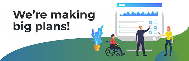 We're making big plans! (People around strategy board)