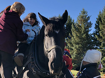 Warehouse Project participants on hay ride