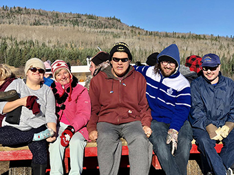 Warehouse Project participants on hay ride